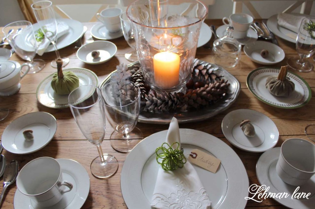 Thanksgiving tablescape, white dishes, farm table, clear glass, green napkin rings, farmhouse