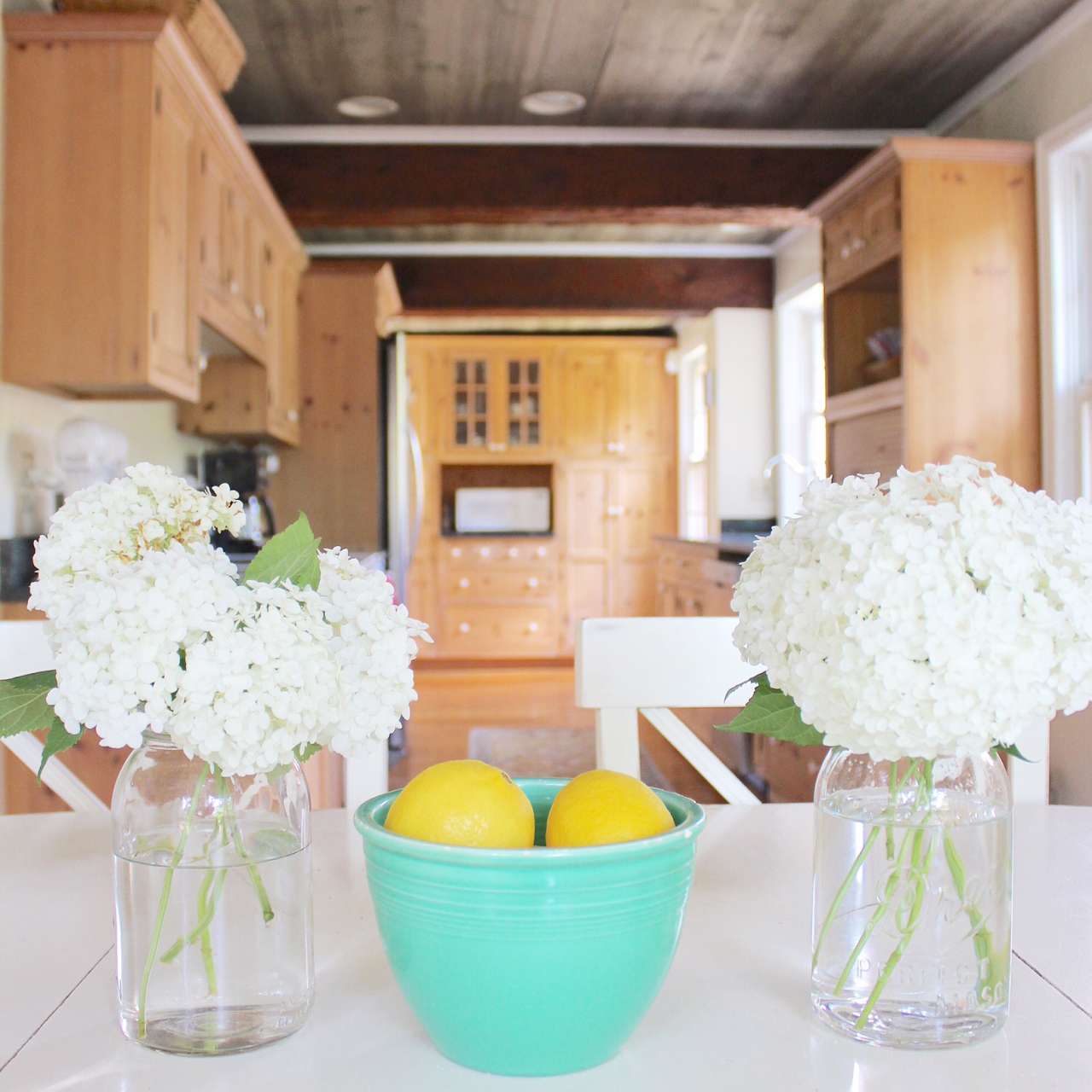farmhouse summer tour - kitchen with ceiling beams