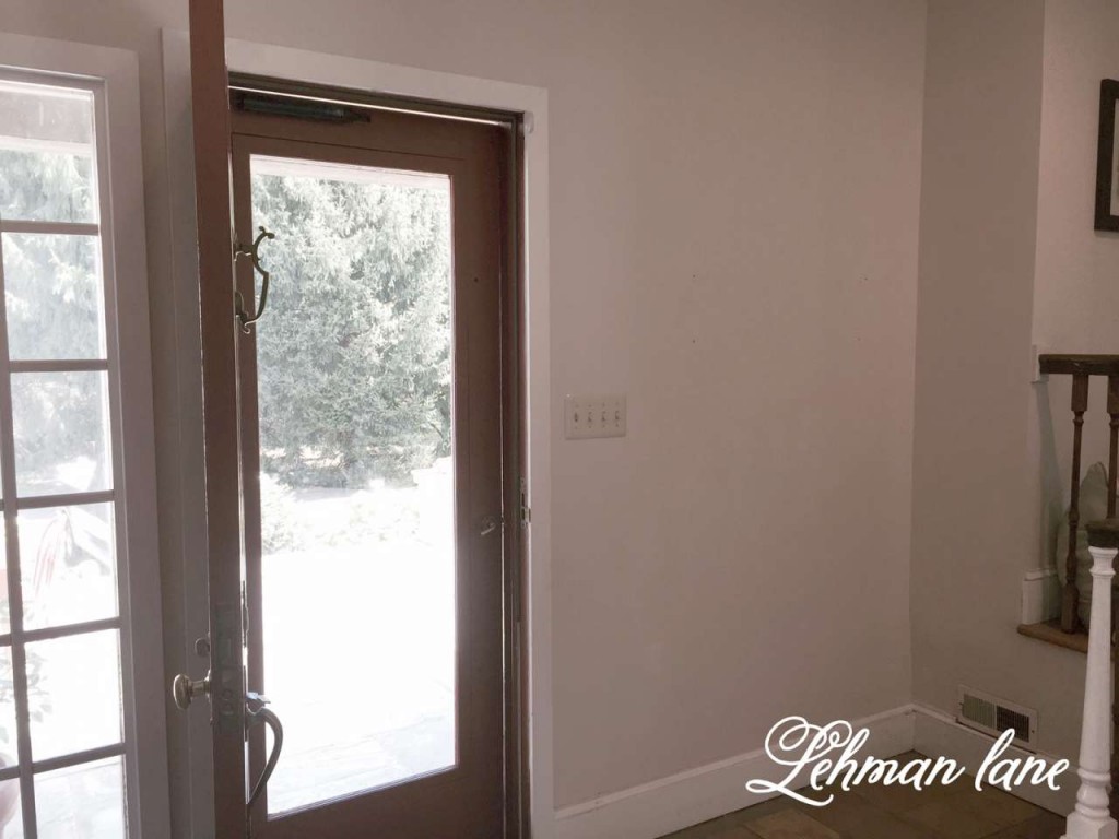 Stop by to see all the progress we made for our farmhouse fixer upper! foyer wall before