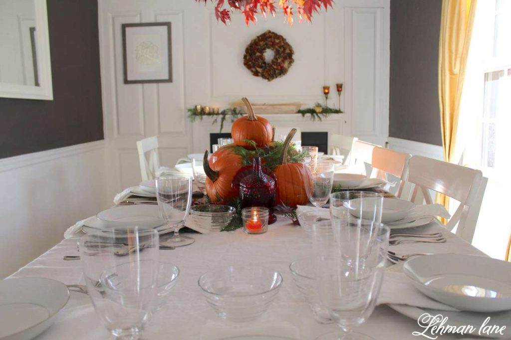 Thanksgiving Table with reall pumpkin and fall leaves. Fall Decorating Ideas and Farmhouse Tour #fall #autumn #thanksgiving http://lehmanlane.net