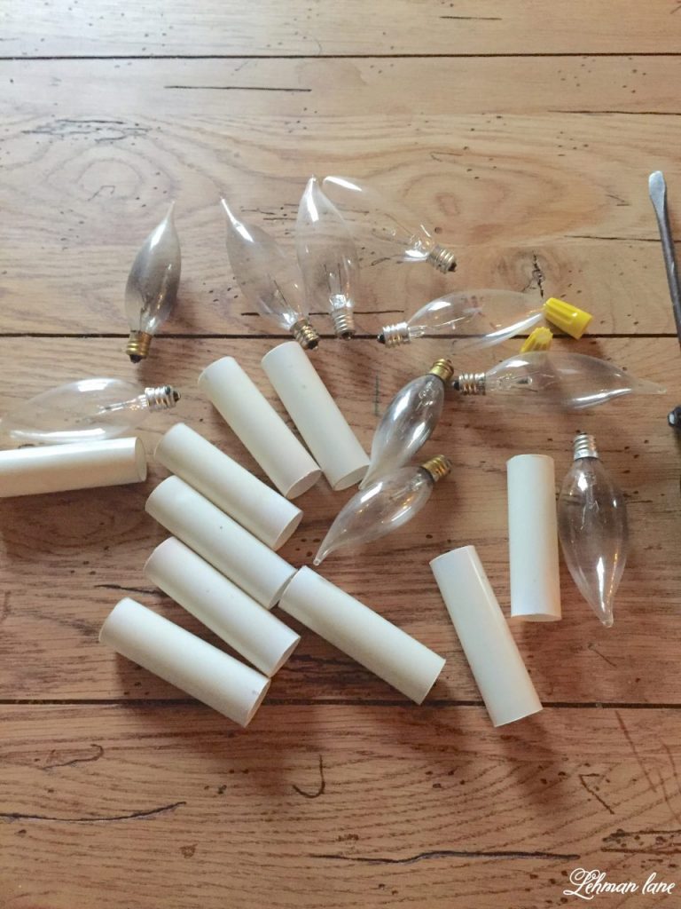 Chandelier Makeover - bulbs and candlestick sleeves