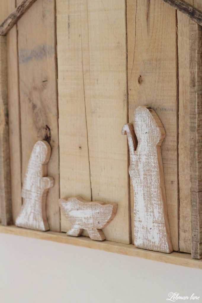 DIY Christmas Pallet Nativity Sign - I am sharing how we created our newest pallet project to decorate our farmhouse for Christmas.  We made it for FREE in less than 2 hours. #palletprojects #christmas #diy http://lehmanlane.net