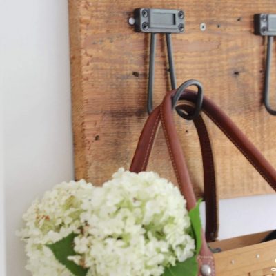 Farmhouse DIY Towel Rack - I created this beautiful, heavy duty and inexpensive DIY towel rack for our farmhouse kitchen.  Sharing my simple step by step instructions for how to make a towel rack of your own to hang coats, aprons, bags, baskets and towels! #towelrack #diy #upcycle http://lehmanlane.net