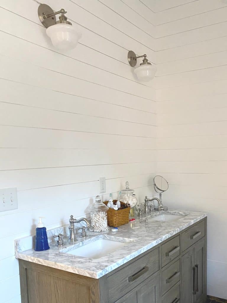Sharing all the details of how we added a beautiful white bead board ceiling and shiplap in the master bath with pictures. #masterbathroom #diyprojects #shiplap https://lehmanlane.net