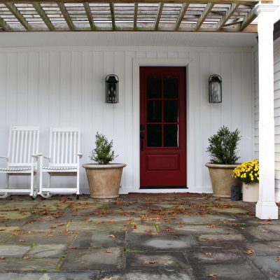 Sharing all the details of the best ultimate curb appeal project DIY, a new gorgeous red farmhouse front door with windows & planters on either side with pictures! #reddoor #farmhousefrontdoor #entrydoor https://lehmanlane.net