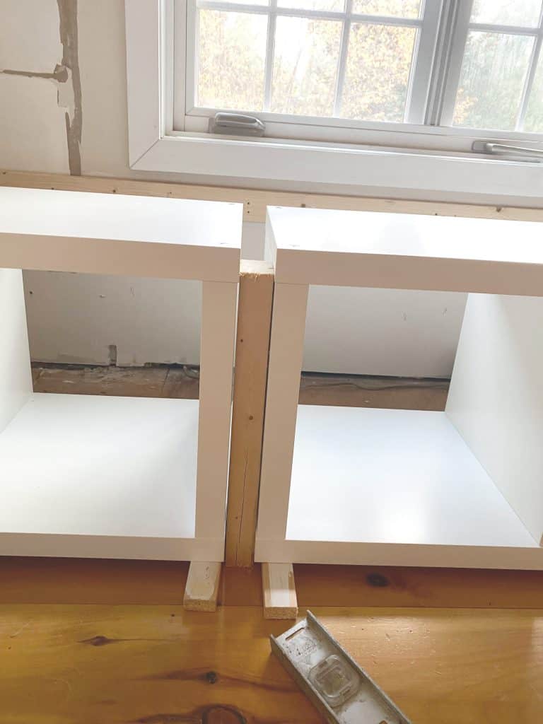 Sharing all our tips and tricks of how we made this easy and awesome DIY Window Seat using a Ikea Kallax Hack Bookshelf as a Bench with step by step pictures. We made the Kallax window seat large enough so it could double as a bed for overnight guests with bookcases underneath to provide extra storage.